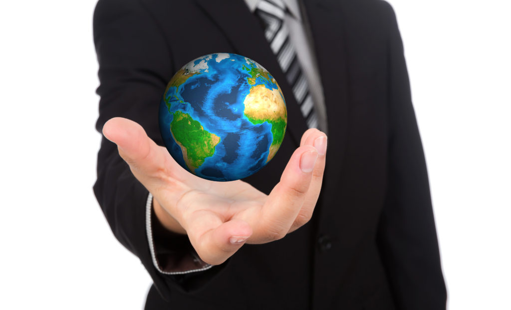 Business man holding earth in his hand (Elements of this image f