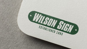 Tasty Ad Designs Logo for Wilson Sign