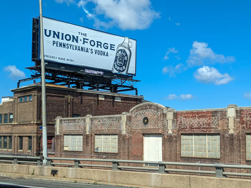 Billboard for Union Forge vodka along I-95 in Philadelphia. (Ella Lathan for Billy Penn)