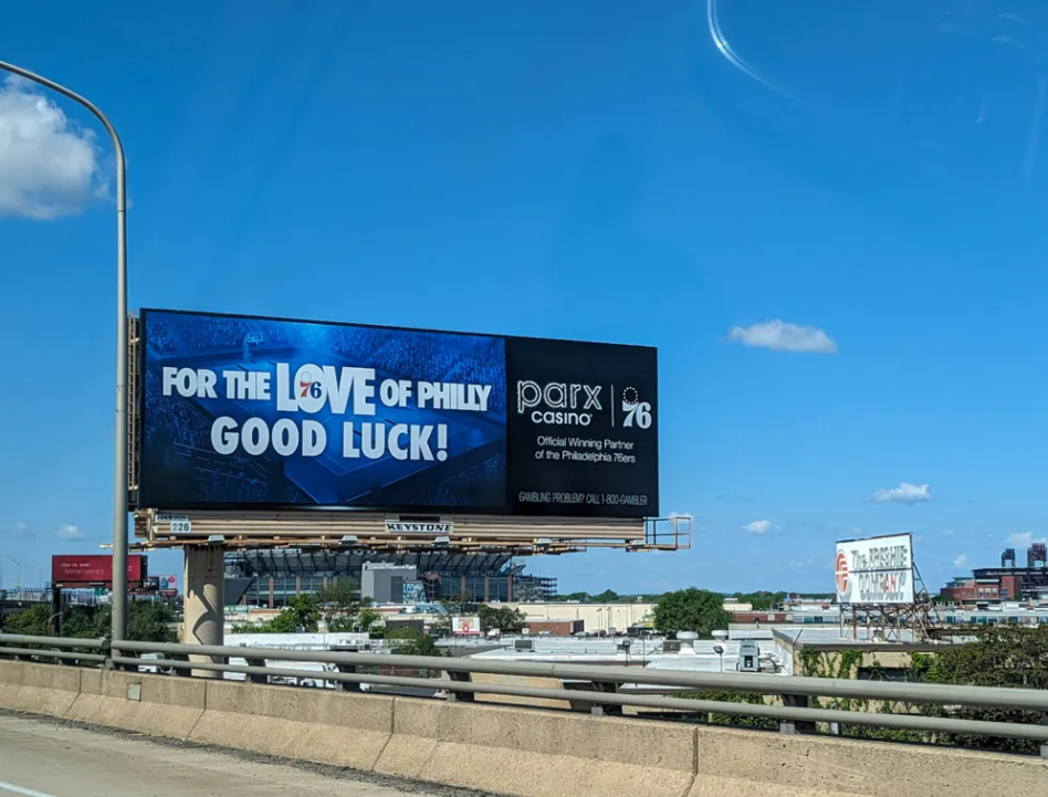 Billboard along I-95 in Philadelphia. (Ella Lathan for Billy Penn)