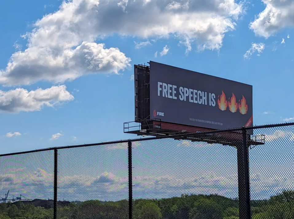 Billboard for FIRE along I-95 in Philadelphia. (Ella Lathan for Billy Penn)